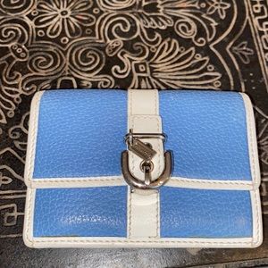 Coach pebbled leather blue and white wallet. Magnetic close
